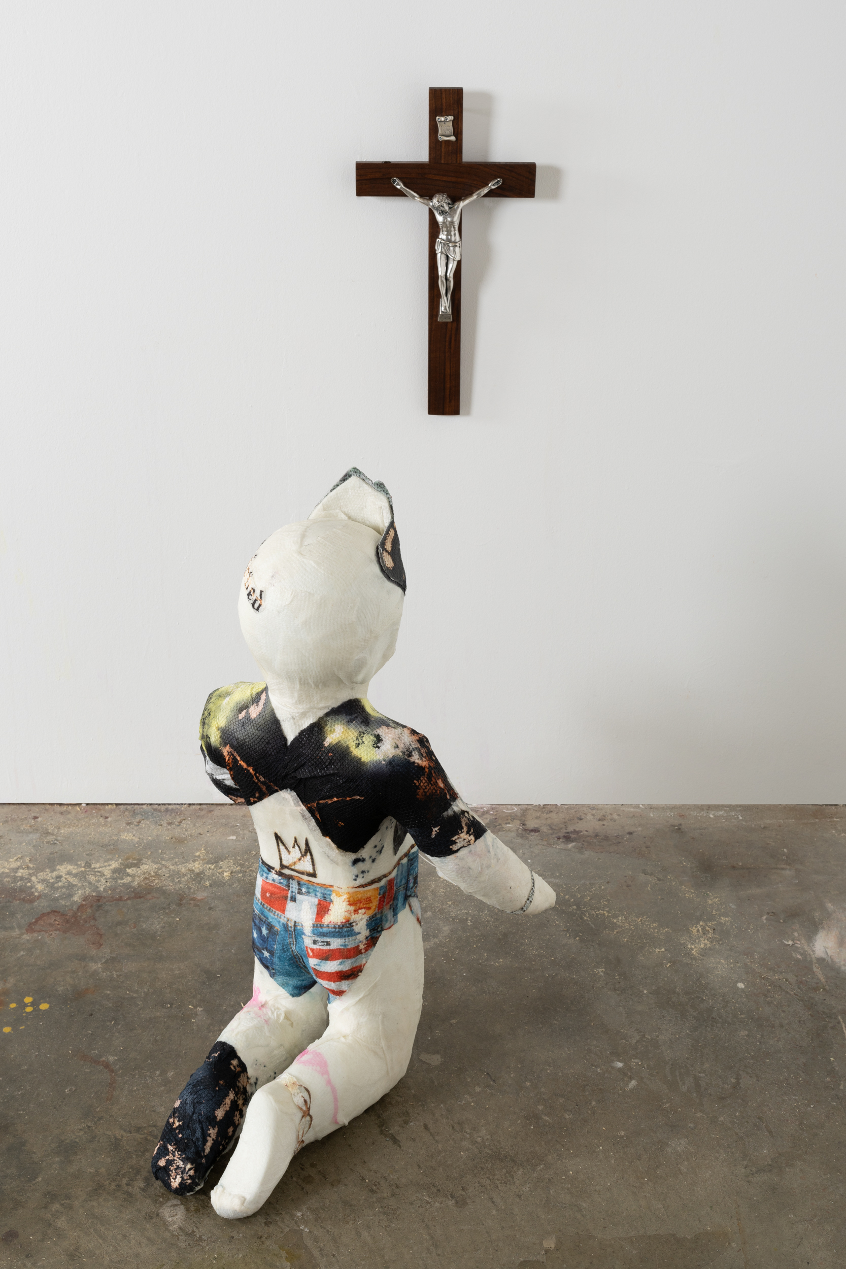 Monsieur Zohore, Beloved (Baby / Maker), 1980-2024, Mixed media on fiberglass, crucifix, rice, 25 x 19 x 14 in.